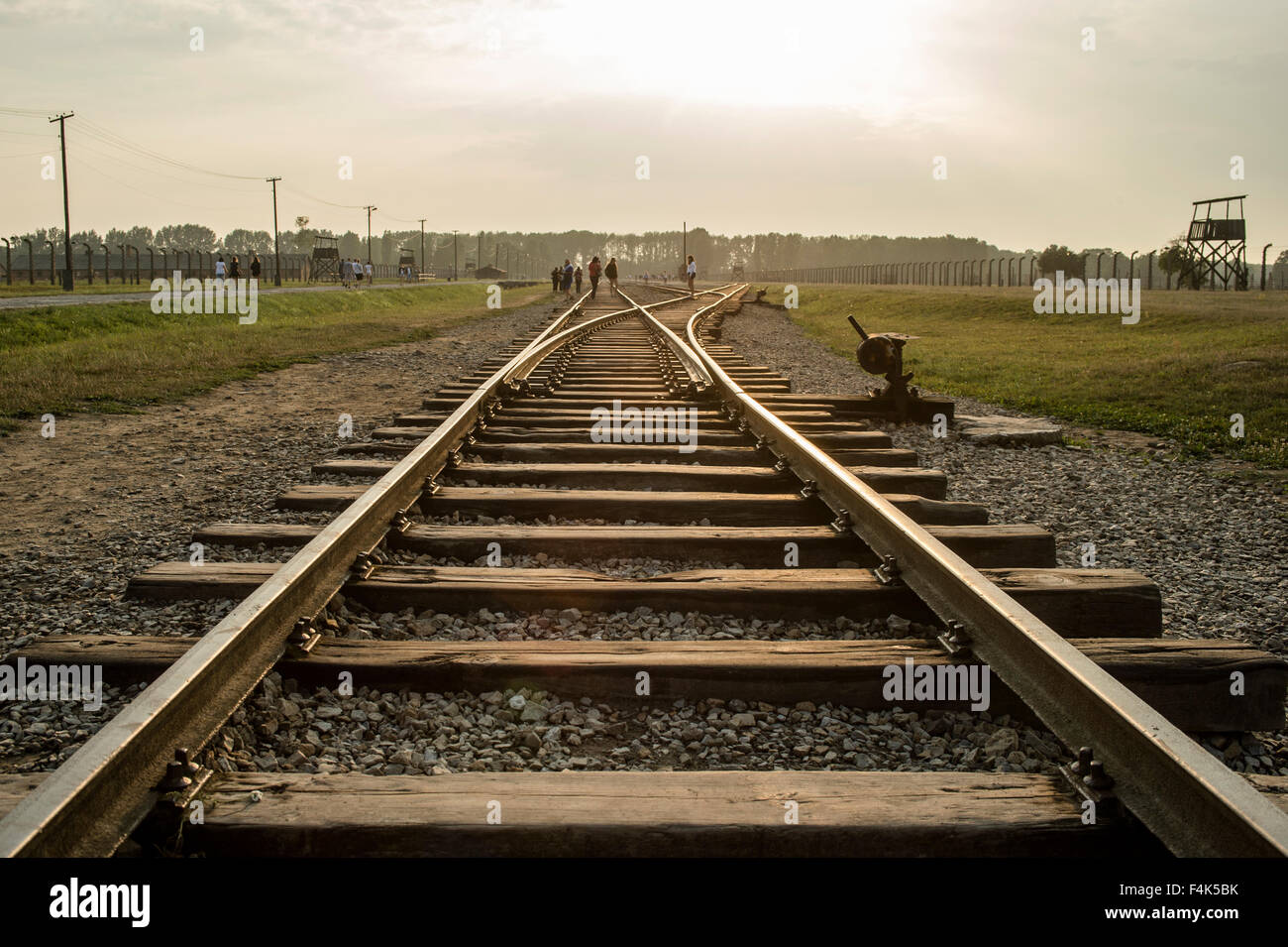A view of train tracks inside Auschwitz II-Birkenau. Stock Photo