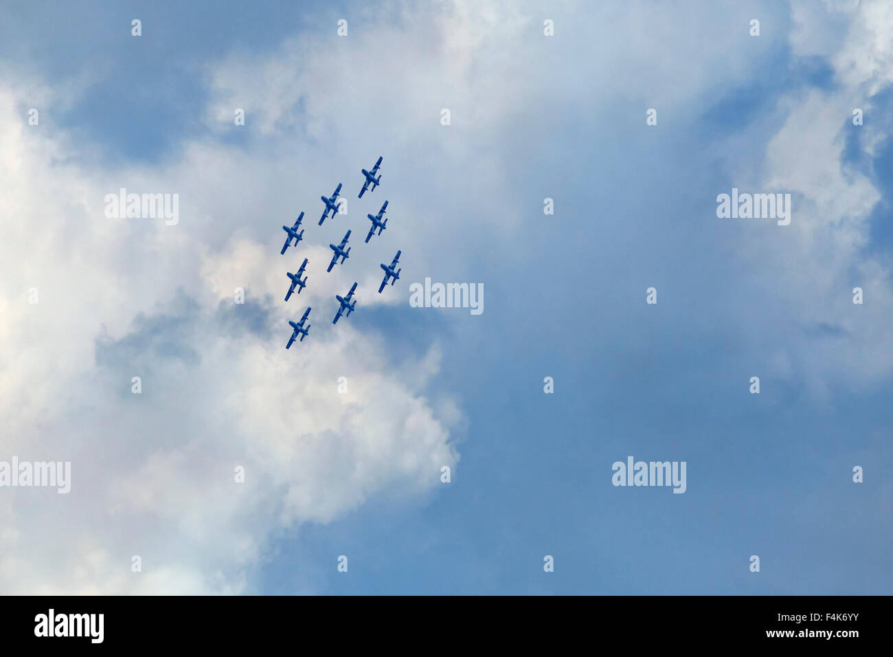 Planes on an air show against cloudy sky Stock Photo - Alamy