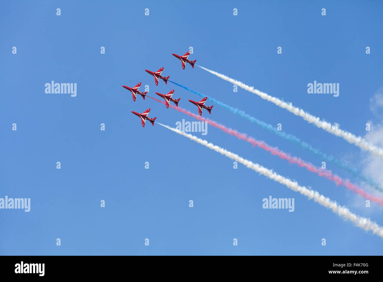 Planes on an air show against cloudy sky Stock Photo - Alamy