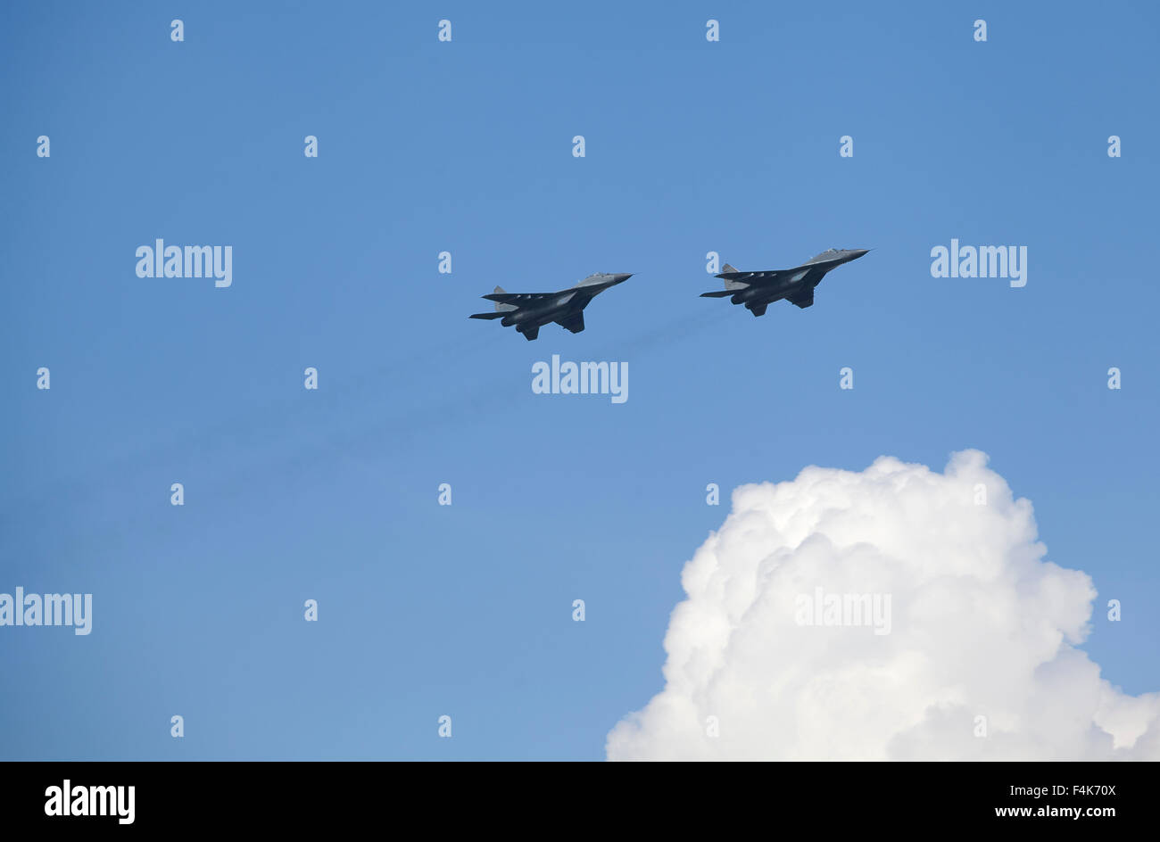 Planes on an air show against cloudy sky Stock Photo - Alamy
