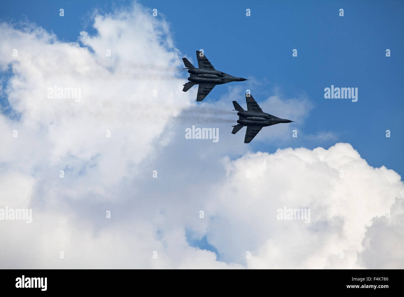 Planes on an air show against cloudy sky Stock Photo - Alamy
