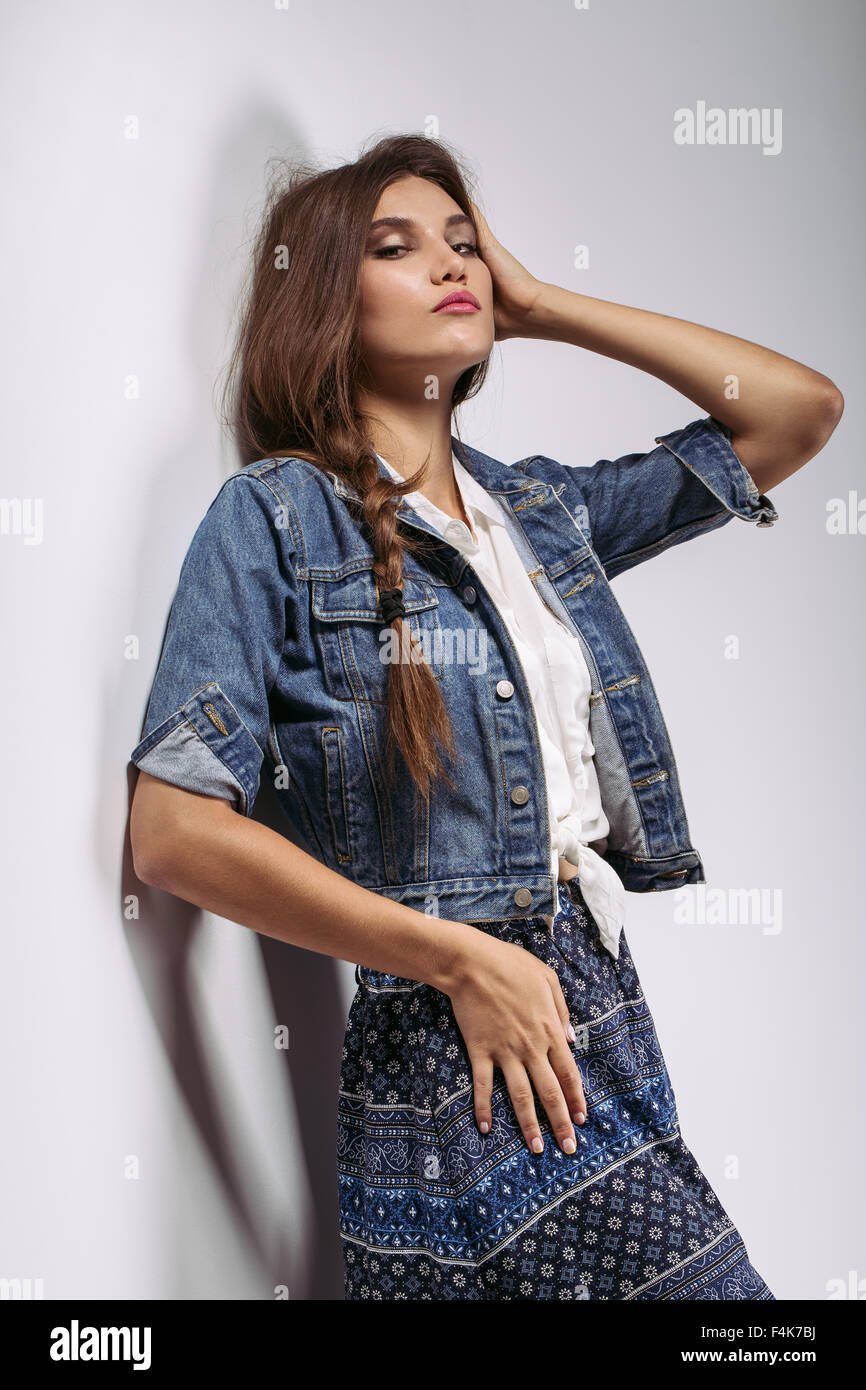 fashion female model posing on light background Stock Photo