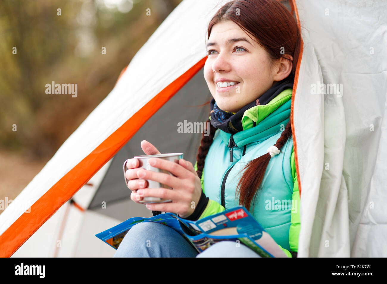 Camping happy woman Stock Photo - Alamy