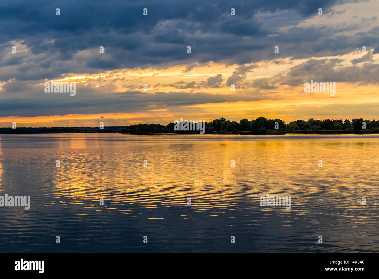 Sunset with dramatic sky over Nove Mlyny lake, Mikulov, Czech Republic Stock Photo