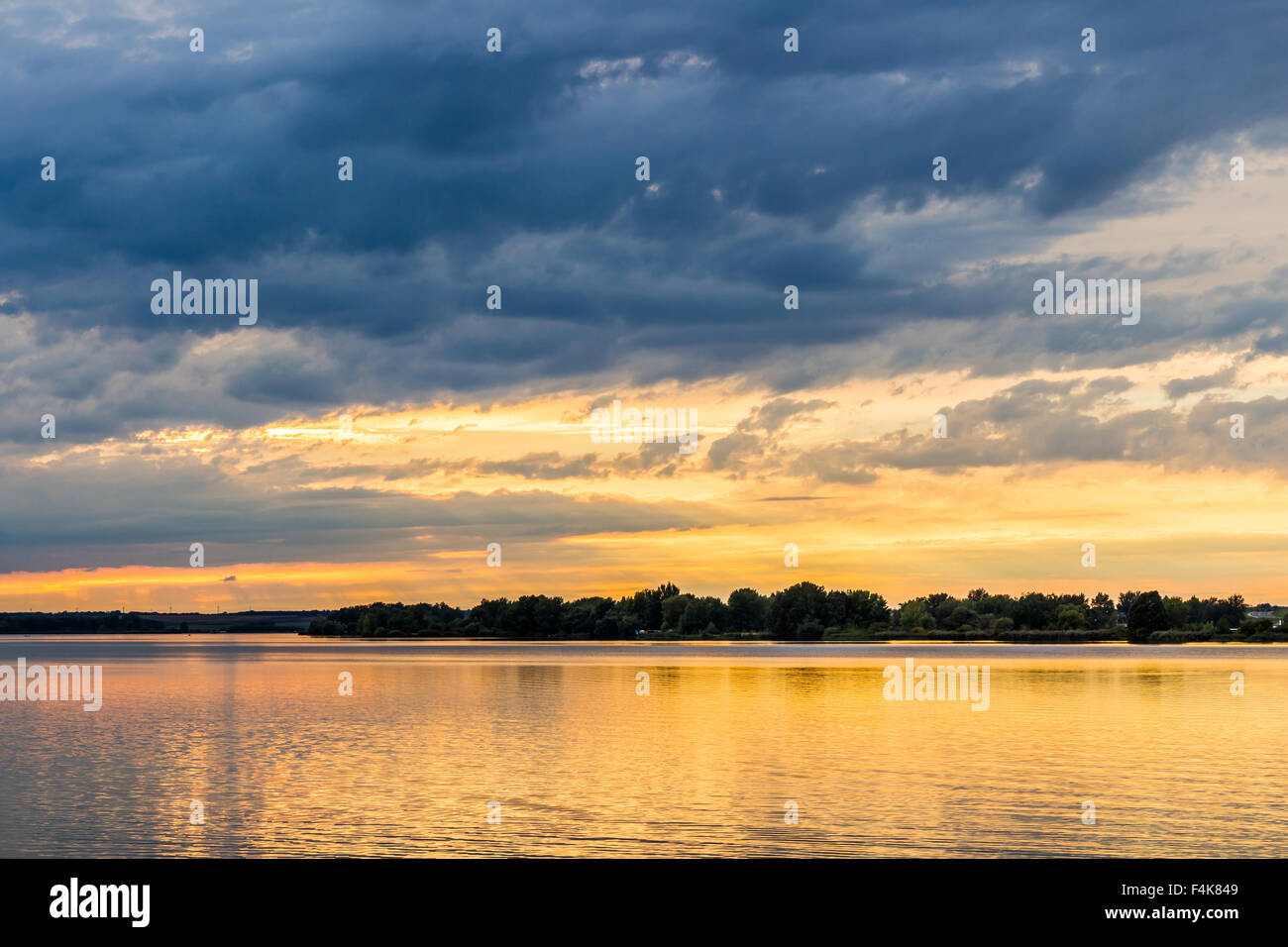 Sunset with dramatic sky over Nove Mlyny lake, Mikulov, Czech Republic Stock Photo