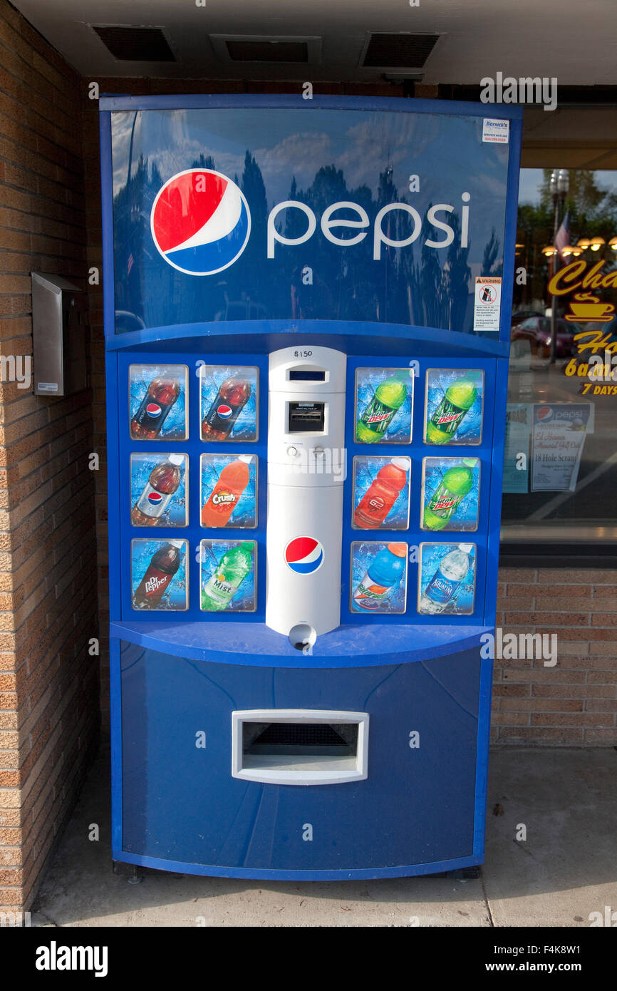 Outside coin operated vending machine for Pepsi soda products. Freeport Minnesota MN USA Stock Photo