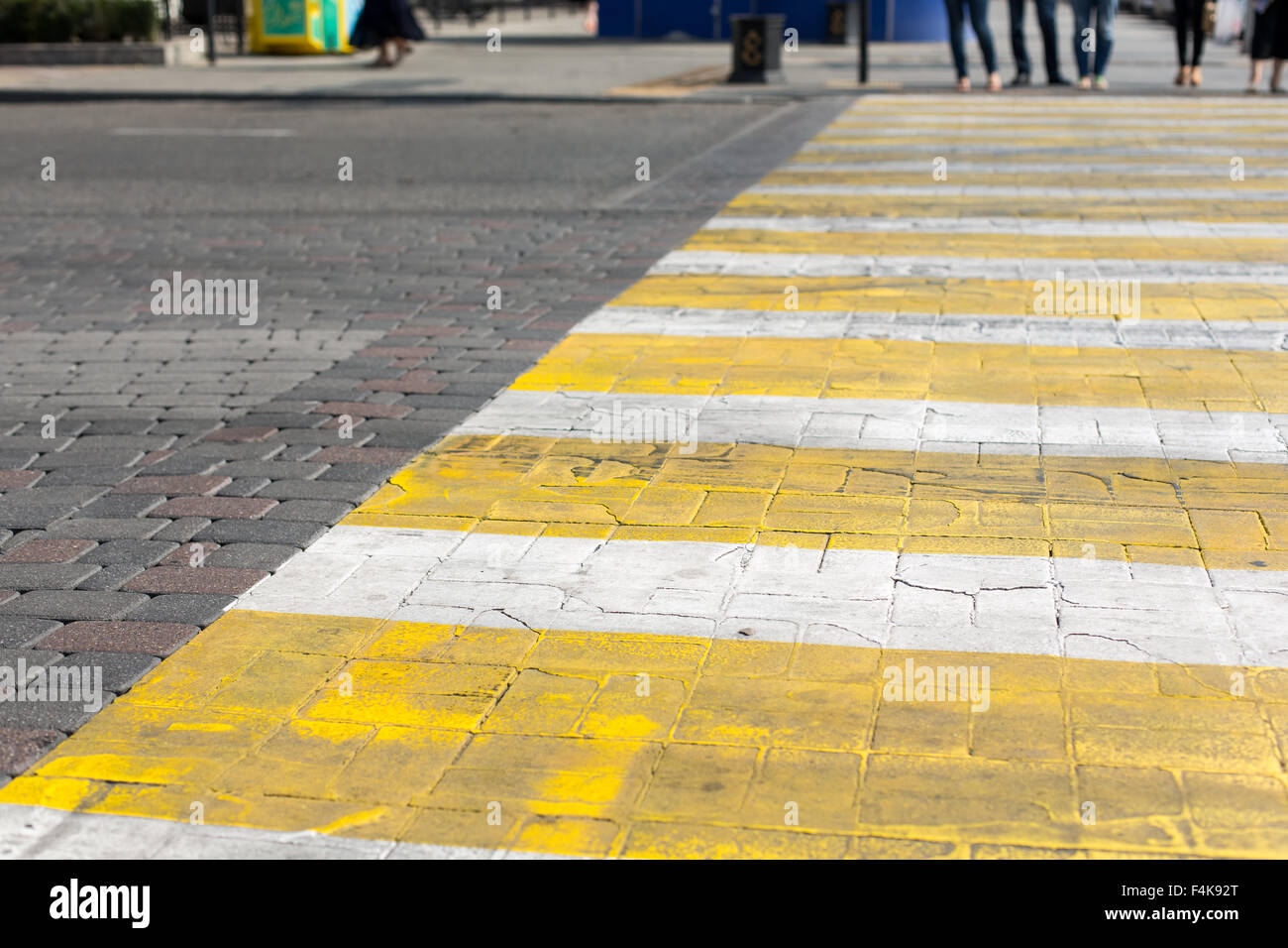 Crosswalk yellow lines on the road pedestrian road crossing area Stock