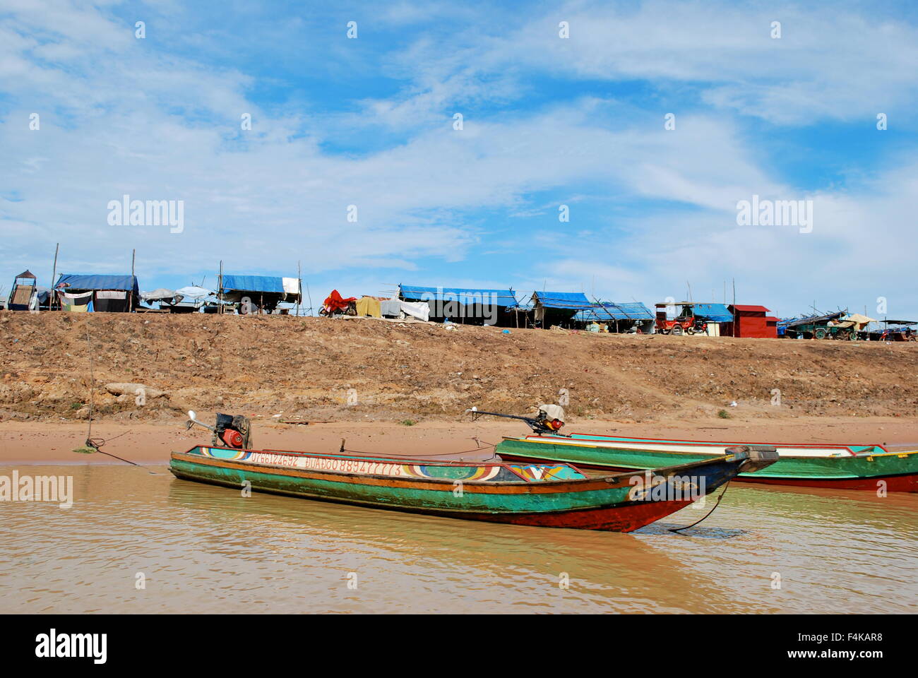 Small fishing boat on Tonle Sap River, Cambodia Stock Photo