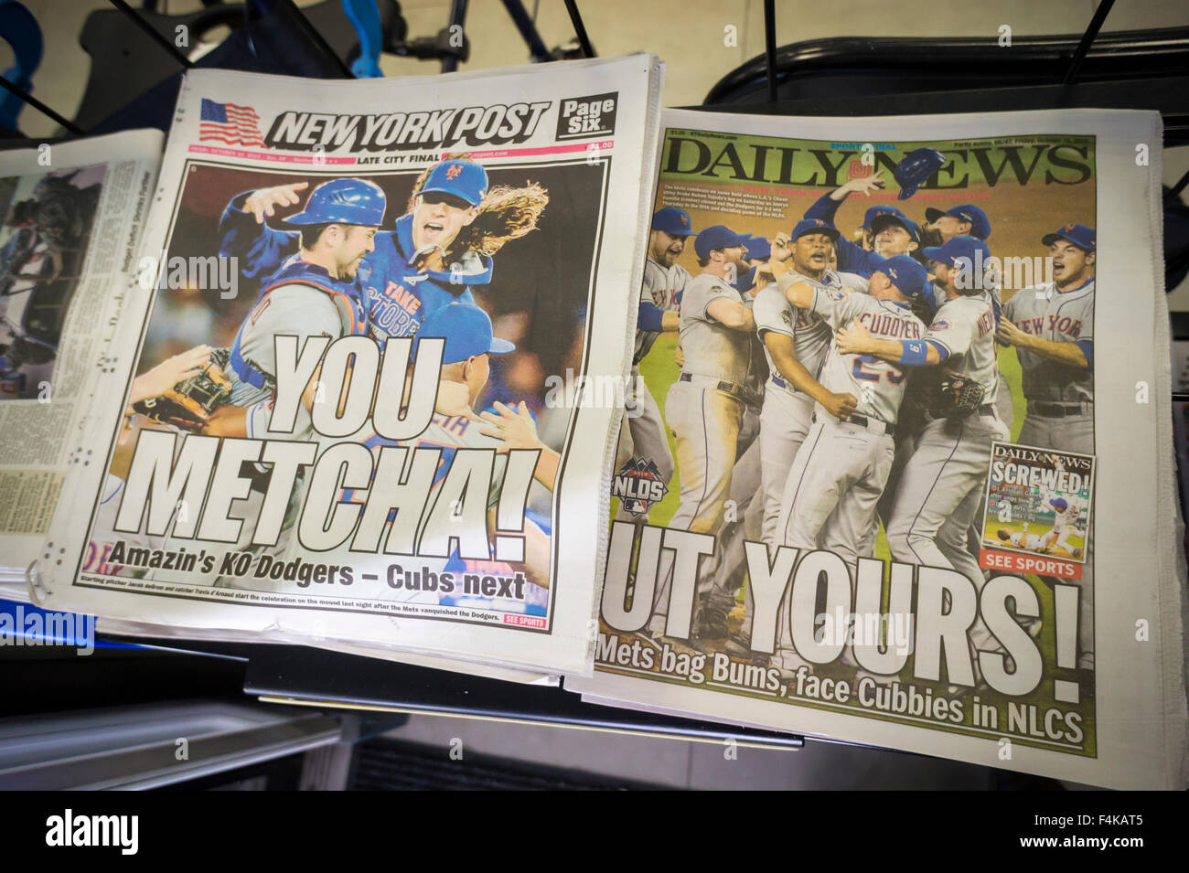 Headlines of New York newspapers are seen on Friday, October 16, 2015 reporting on the previous days win by the New York Mets against the Los Angeles Dodgers clinching the National League Division Series (NLDS) The Mets now go on to play the Cincinnati Cubs. for the National League Championship Series (NLCS).  (© Richard B. Levine) Stock Photo