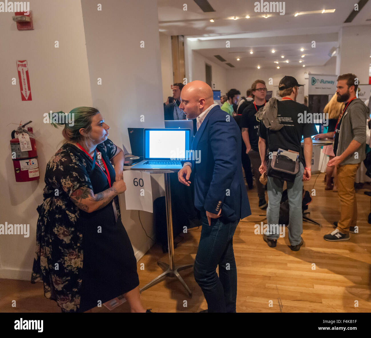 Visitors and job seekers crowd the Techweek expo in New York event on Thursday, October 15, 2015. Thousands of visionaries and entrepreneurs attended to network with established and start-up technology companies. (© Richard B. Levine) Stock Photo