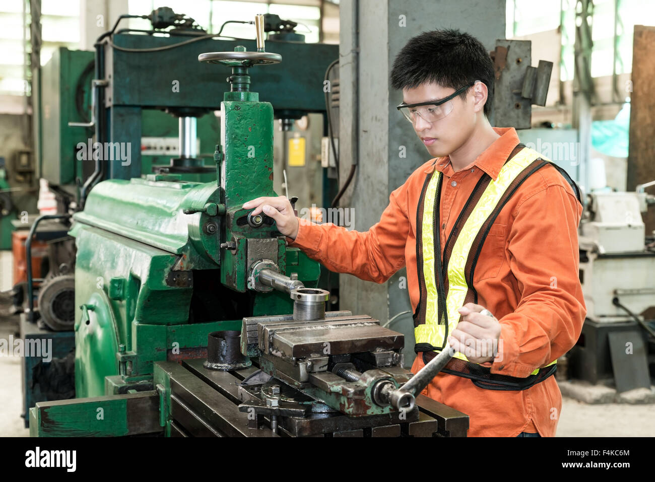 Mechanical Engineering control lathe machine in factory Stock Photo