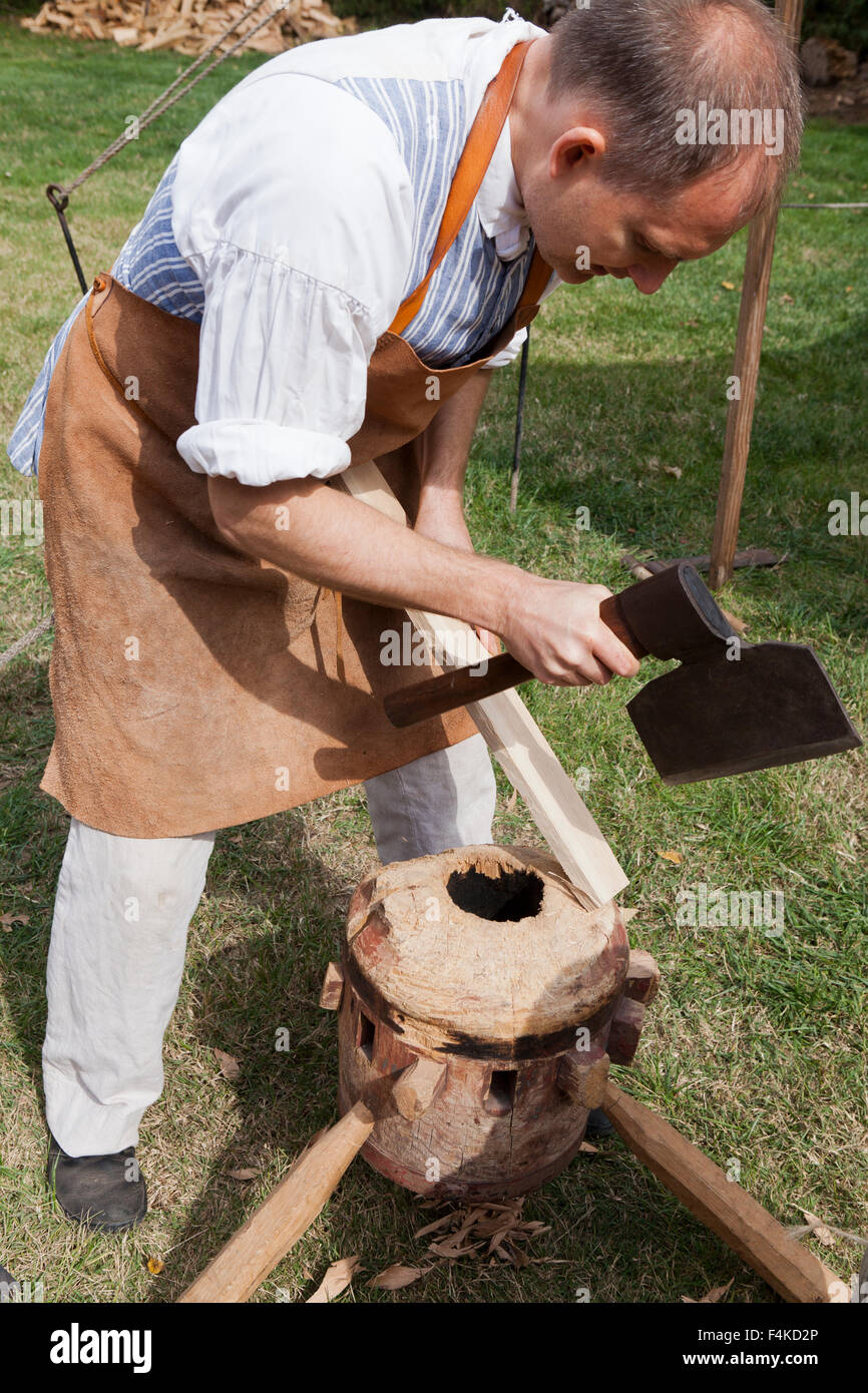 18th century cooper shaping a stave for a wooden cask - Mount Vernon, Alexandria, Virginia USA Stock Photo