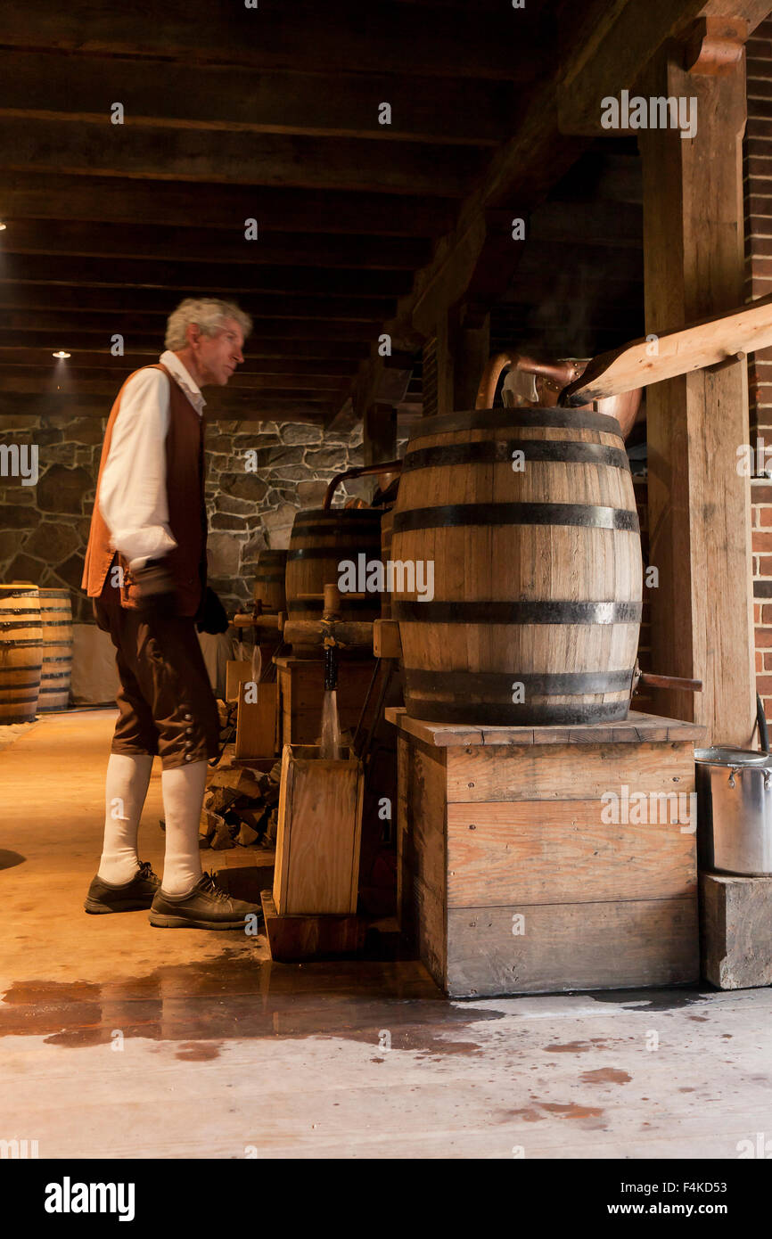 Whiskey Distiller working at Washington's distillery, Mount Vernon Alexandria, Virginia