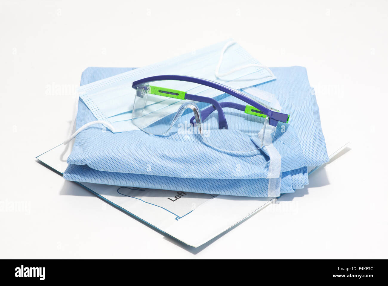 Gloves, mask, gown and safety glasses Stock Photo Alamy