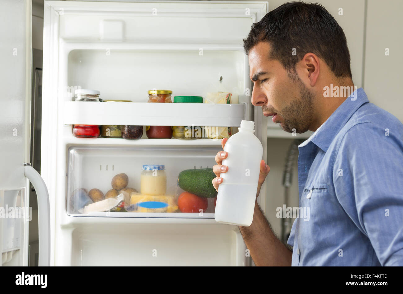 Child smelling food shirt hi-res stock photography and images - Alamy