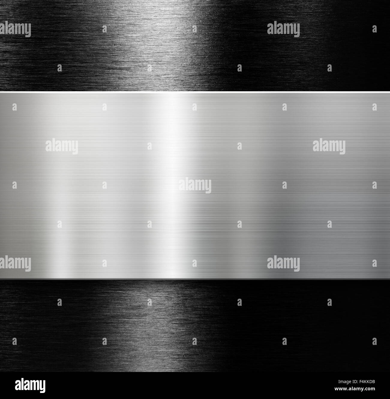 metal plate over black brushed aluminum background Stock Photo