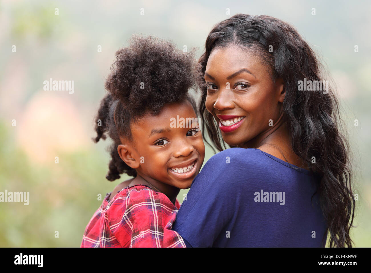 Happy Mother and Child Outdoors. Stock Photo
