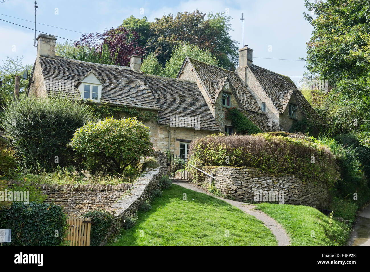 Ancient cottages, Bibury, Cotswolds, Gloucestershire, England UK Stock