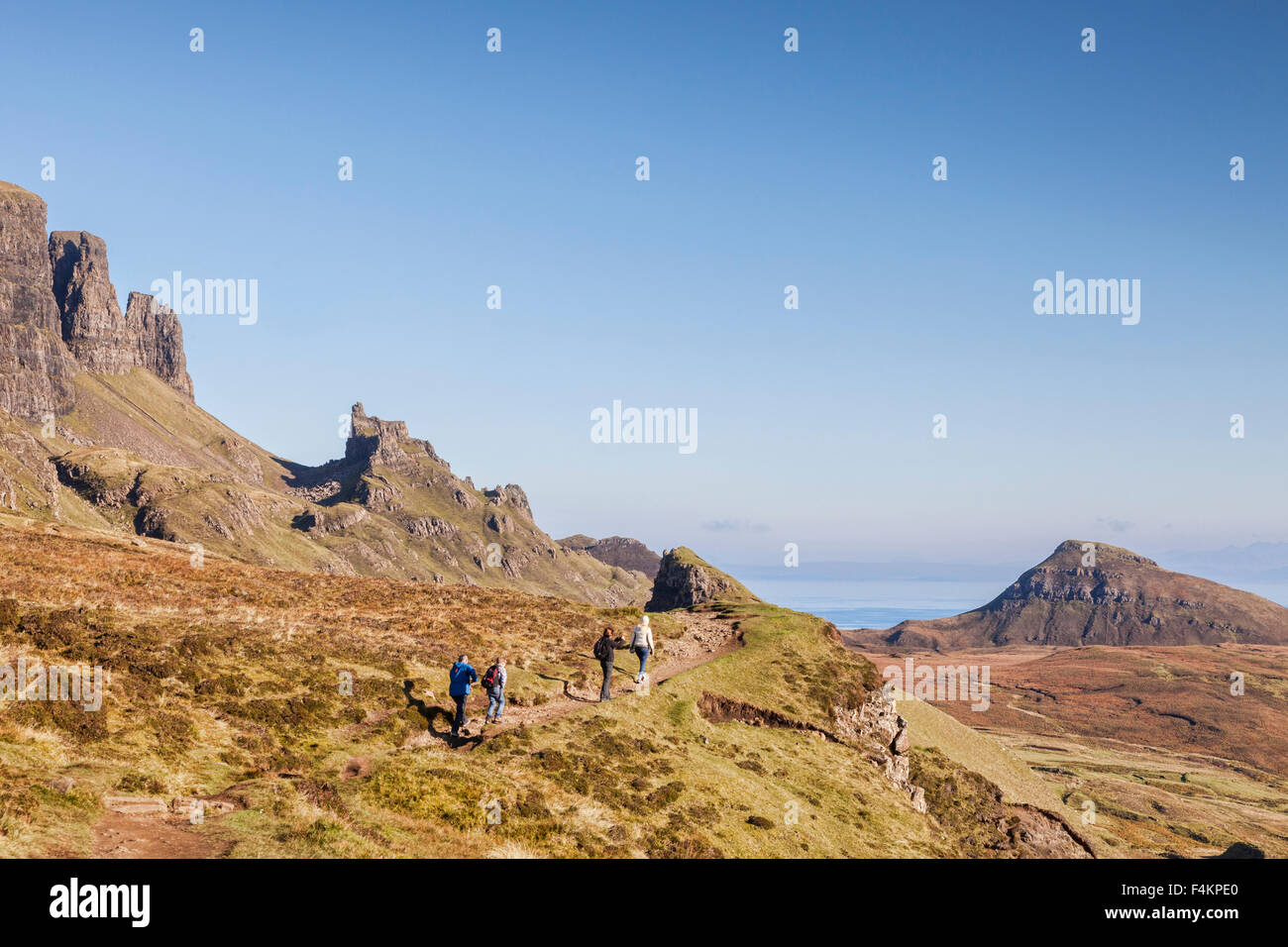 Hikers walking on the path to the Quiraing, Isle of Skye, Inner Hebrides, Scotland, UK Stock Photo