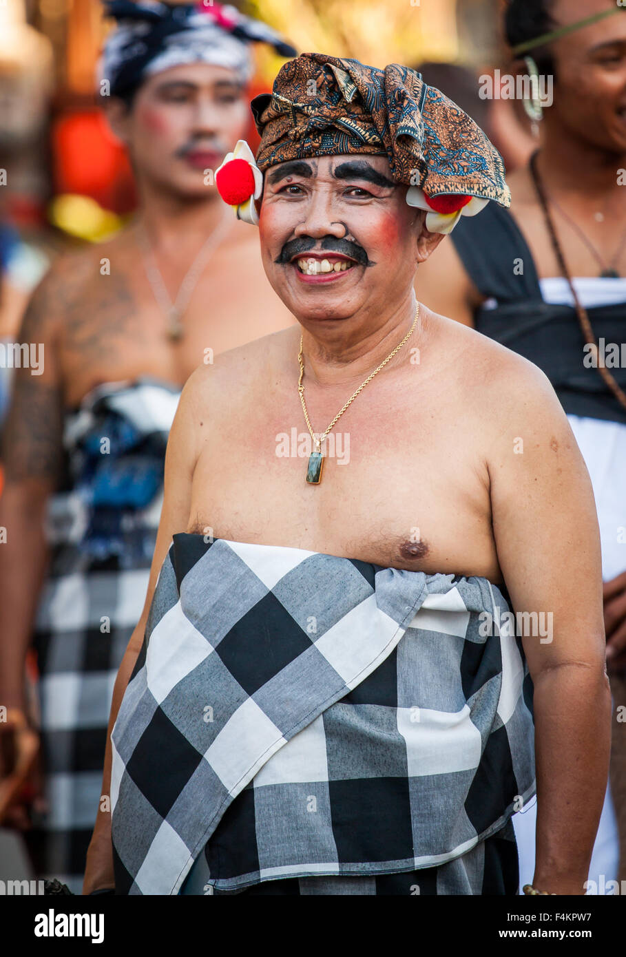 Balinese man in traditional attire at Sanur Village Festival's street parade on August 30th, 2015 in Bali, Indonesia. Stock Photo