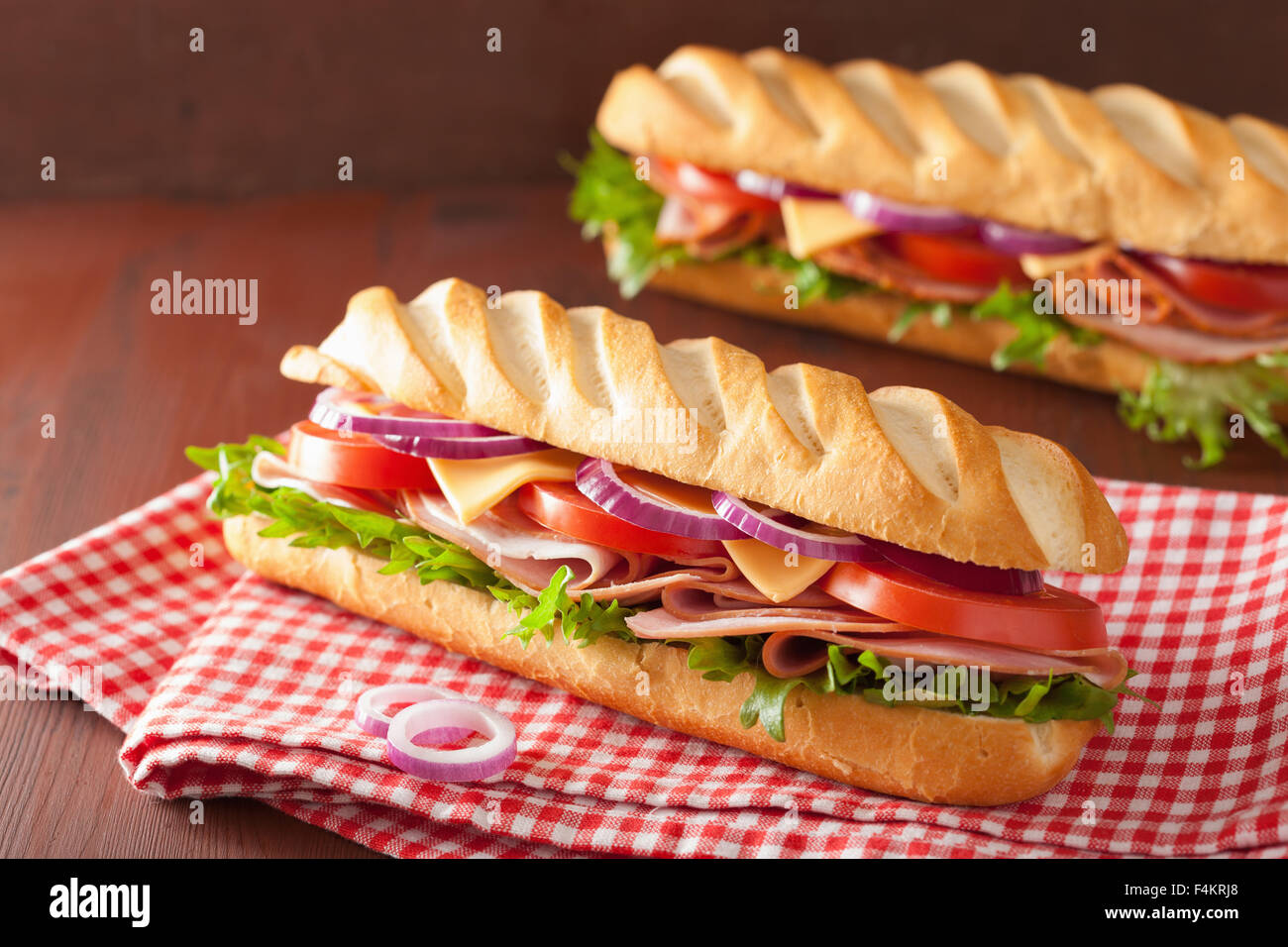 long baguette sandwich with ham cheese tomato lettuce Stock Photo Alamy