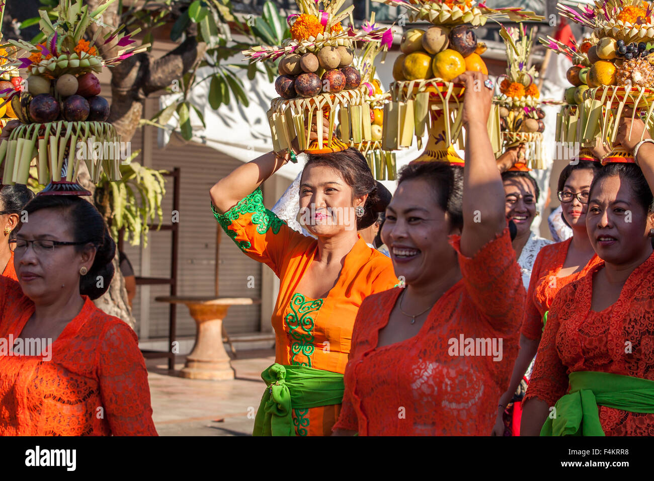 Balinese villagers participating in Sanur Village Festival's street parade Stock Photo