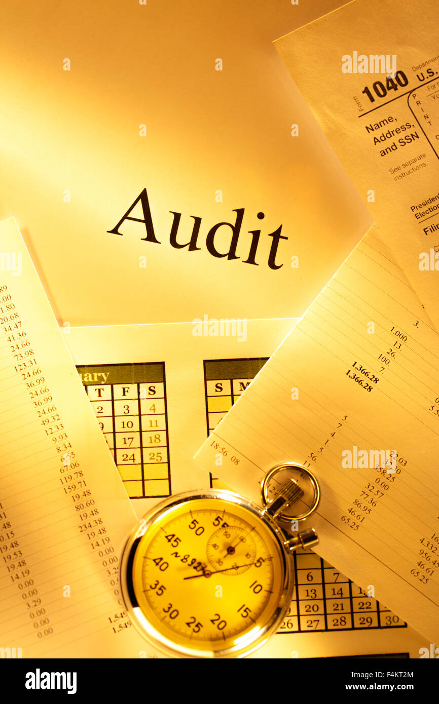 Annual budget, calendar, stopwatch and audit Stock Photo - Alamy