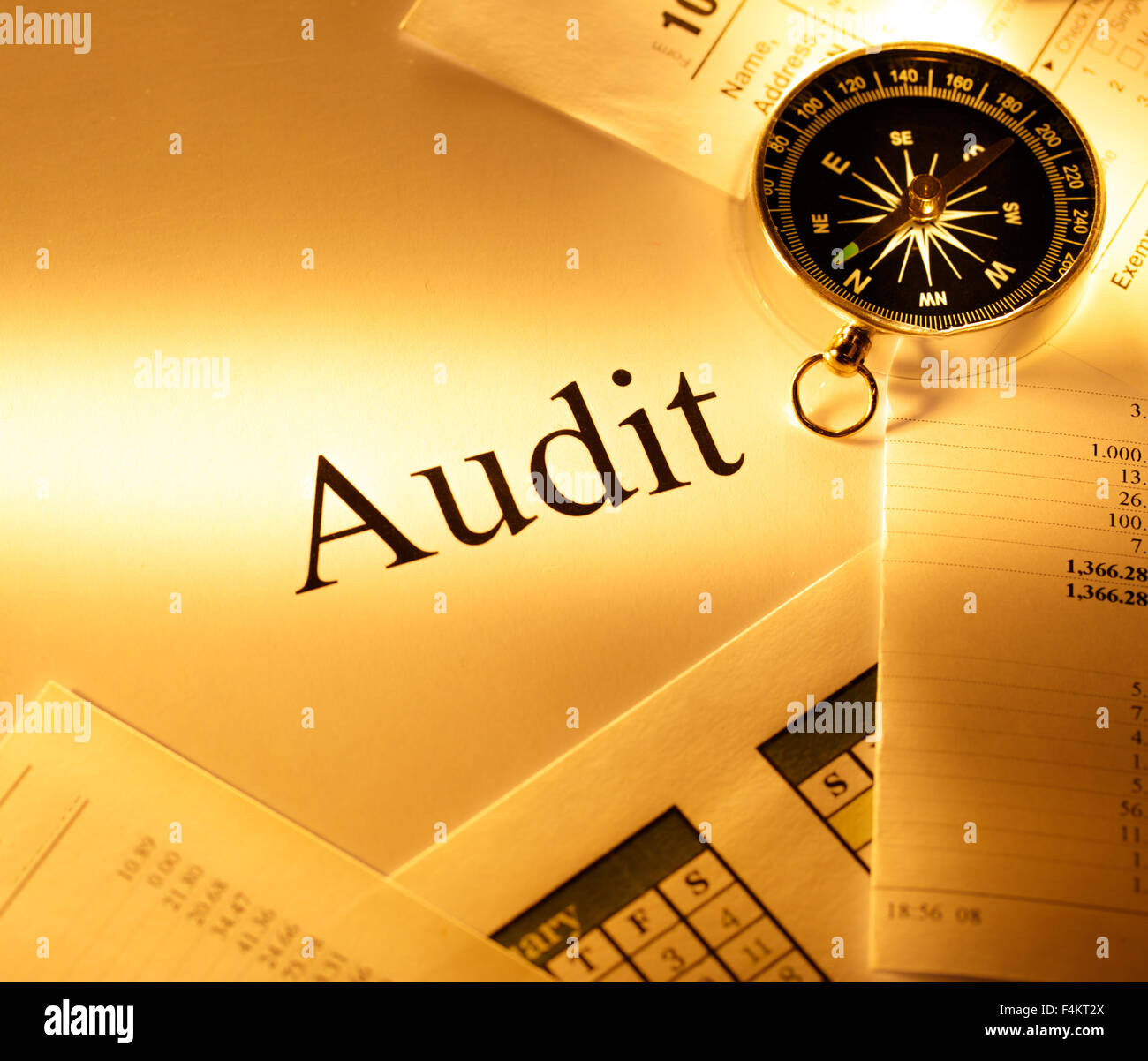 Annual budget, calendar, compass and audit Stock Photo - Alamy