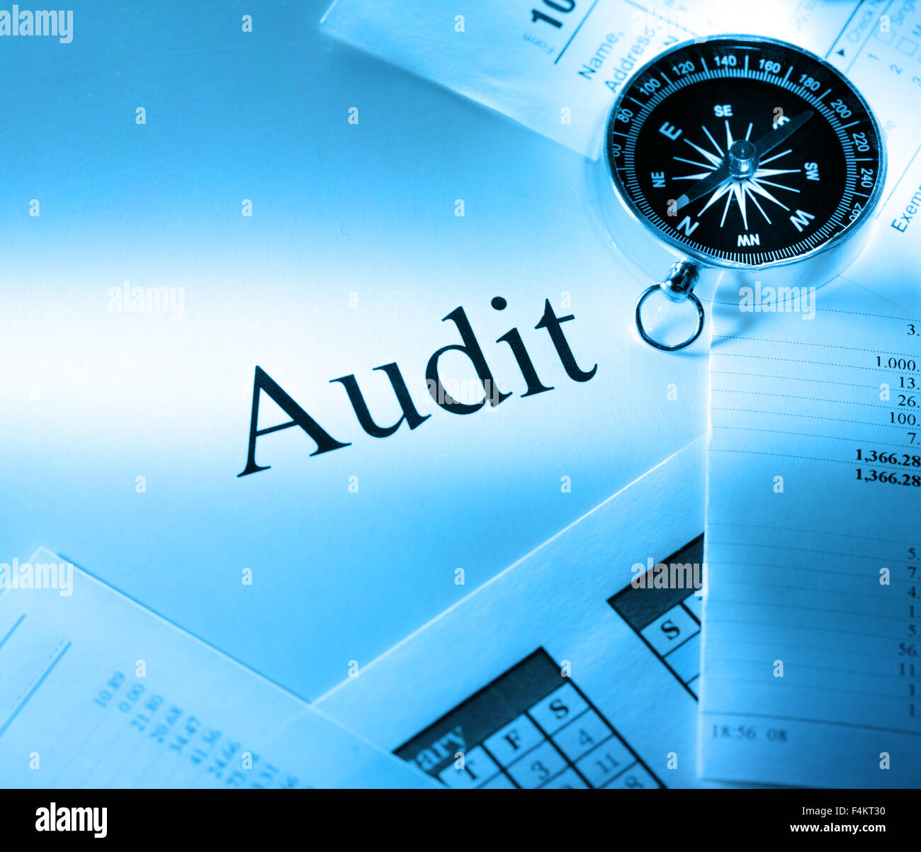 Annual budget, calendar, compass and audit Stock Photo - Alamy