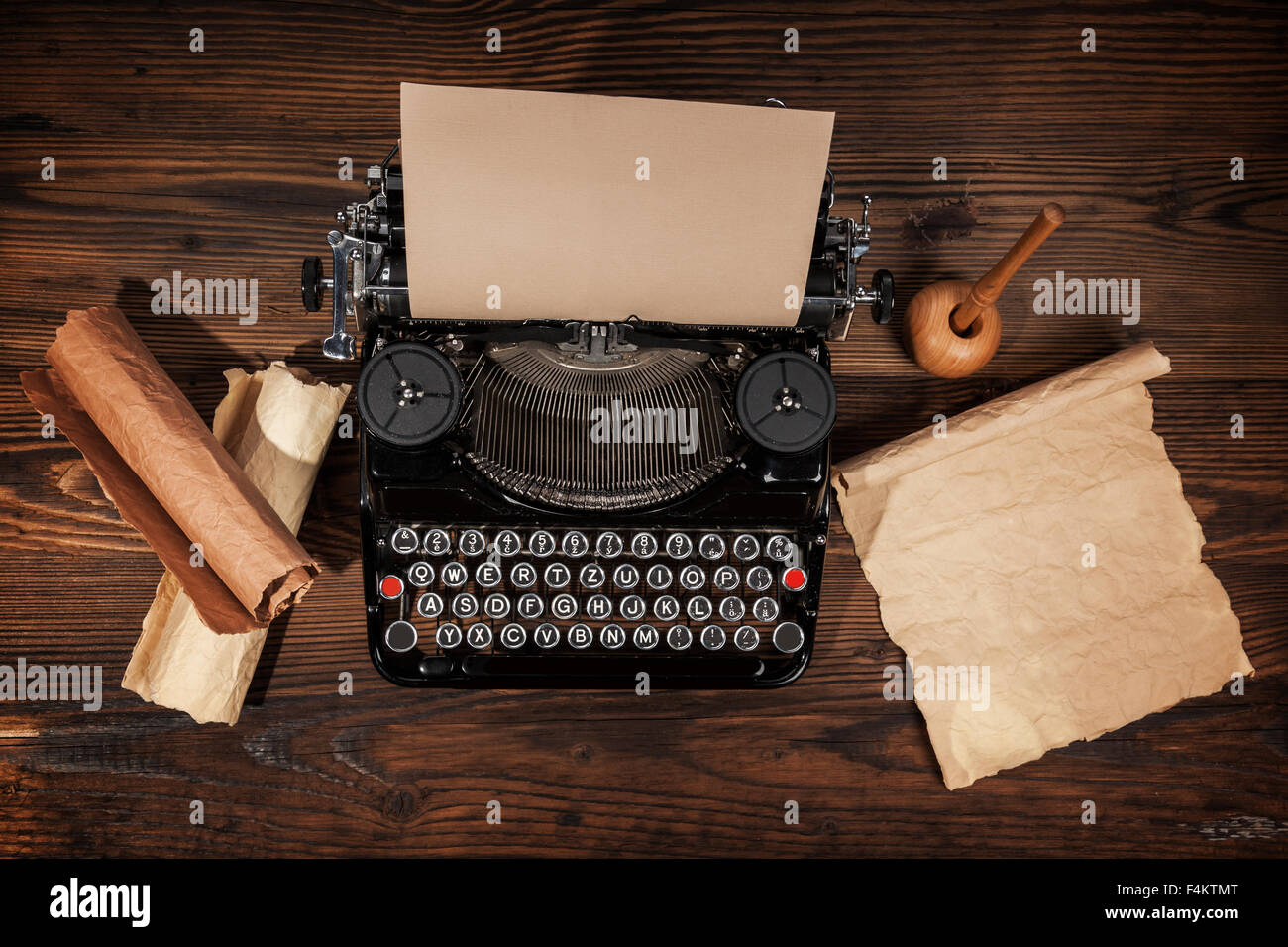 Old typewriter on wooden table Stock Photo