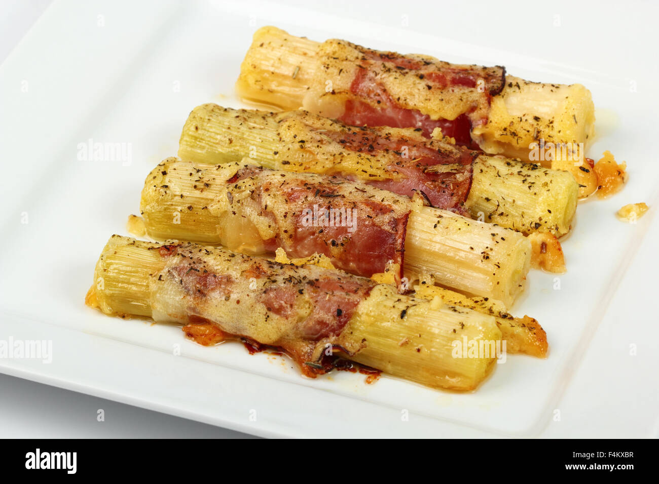 Cheesy leeks and ham Stock Photo Alamy