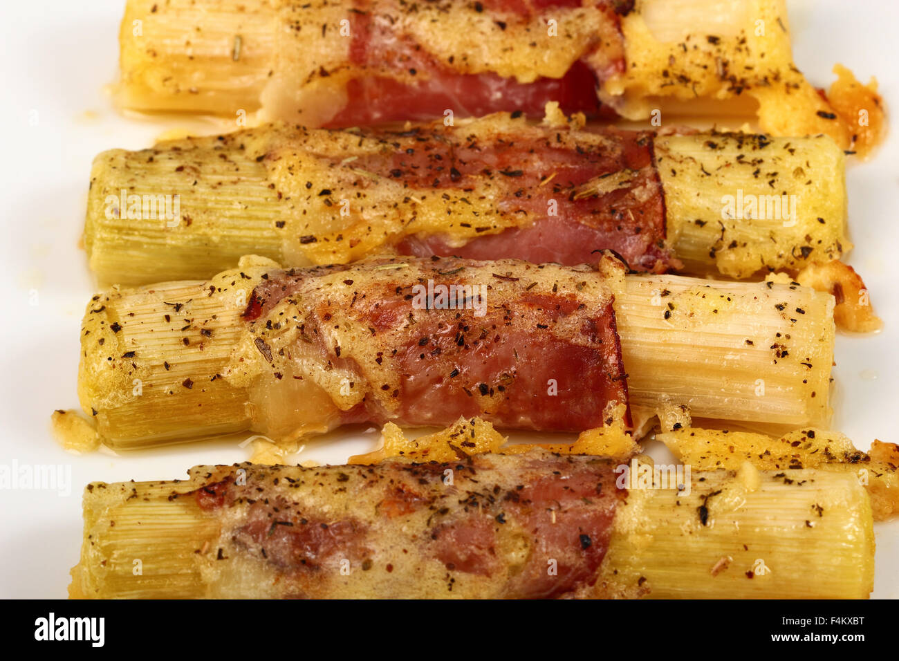 Cheesy leeks and ham Stock Photo Alamy