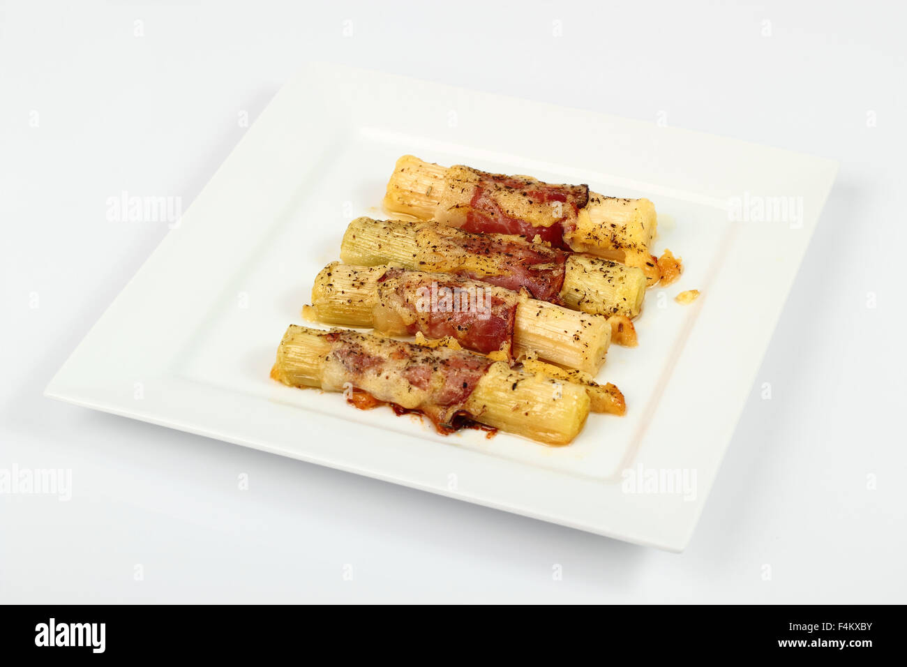 Cheesy leeks and ham Stock Photo Alamy