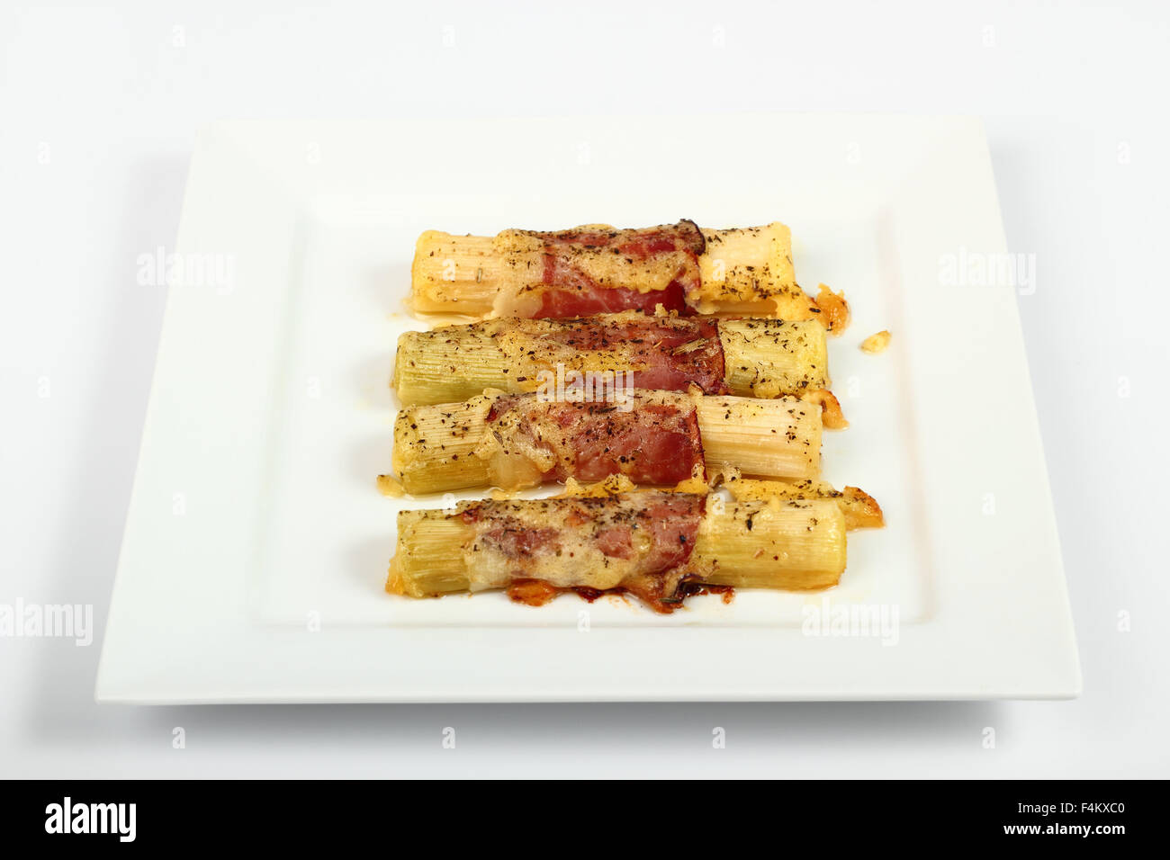 Cheesy leeks and ham Stock Photo Alamy