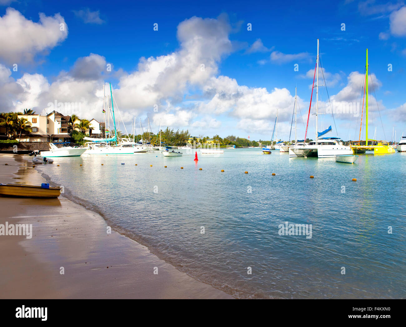 Catamarans and boats in a bay. Grand Bay (Grand Baie). Mauritius Stock Photo