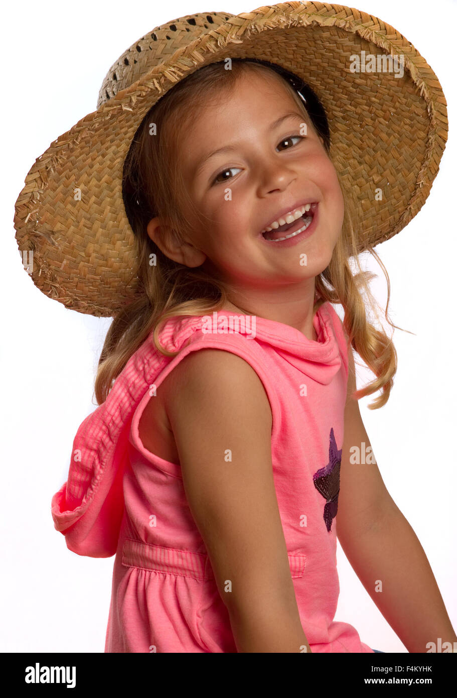 Portrait of a pretty little girl wearing a straw hat Stock Photo - Alamy