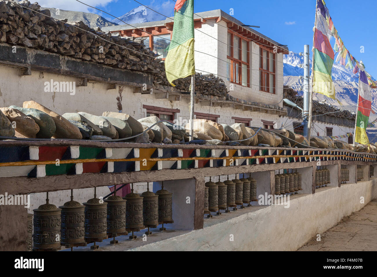 Prayer wheels in picturesque Kagbeni village, Mustang, Nepal. Stock Photo
