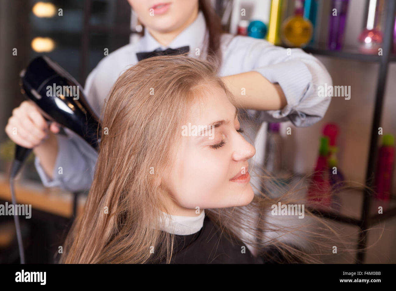 Hair style blonde blow dry hi-res stock photography and images - Alamy