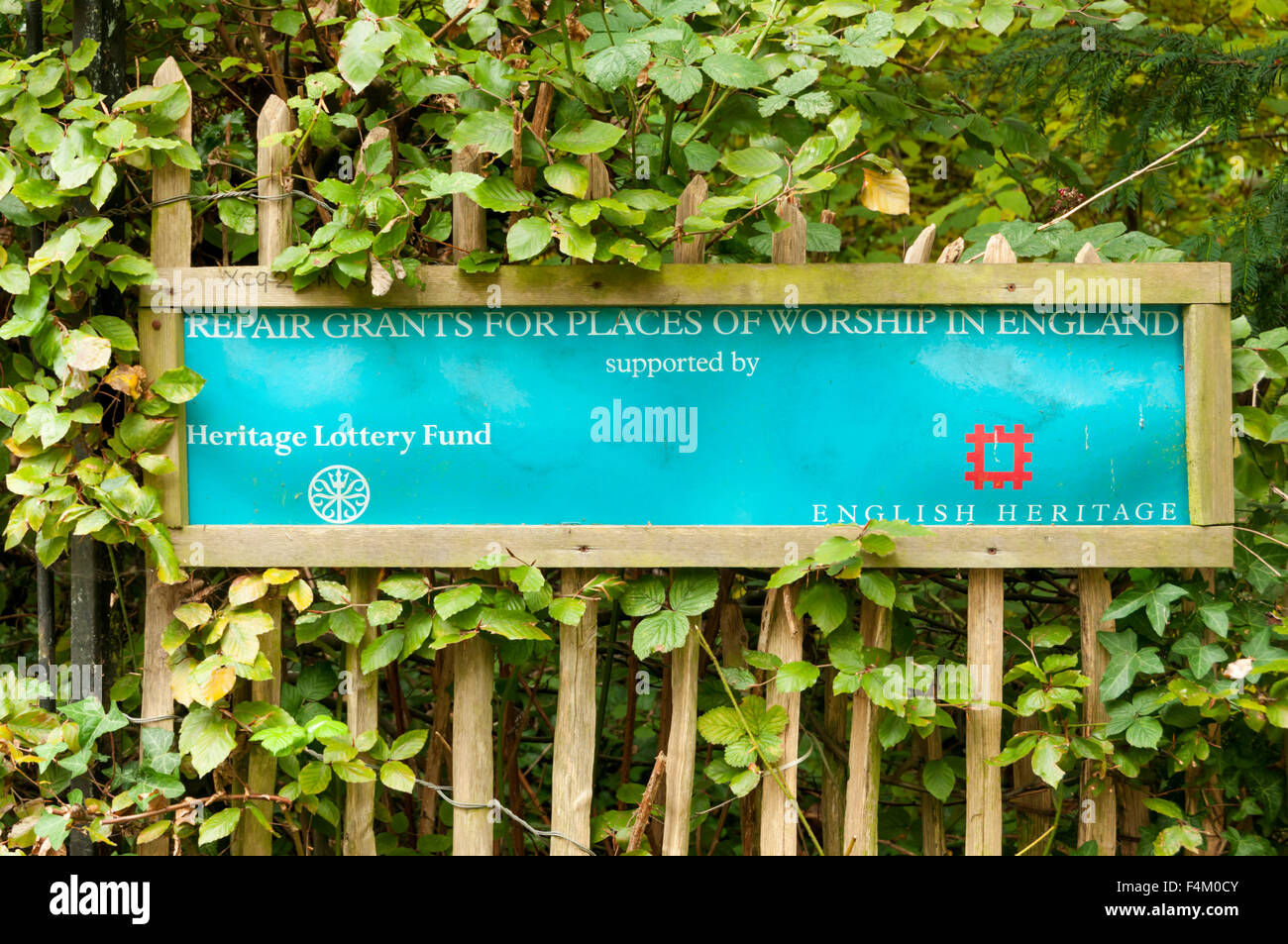 A sign recognising Repair Grants for Places of Worship in England supported by English Heritage & the Heritage Lottery Fund. Stock Photo