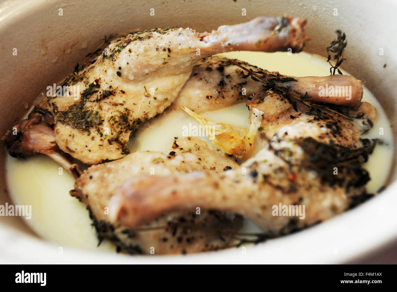 Homemade confit of duck legs cooked in duck fat Stock Photo