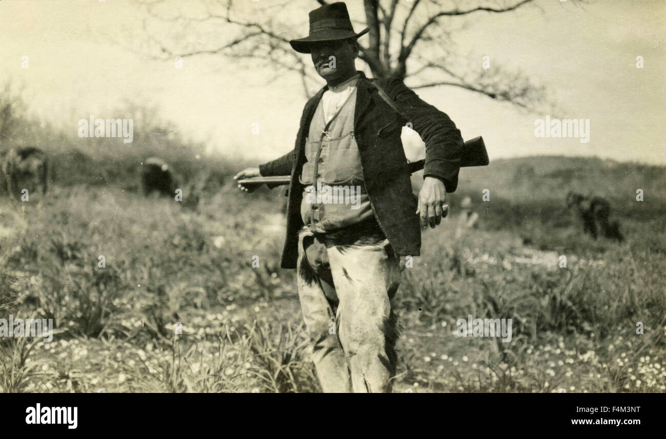 Hunter with rifle, Italy Stock Photo - Alamy