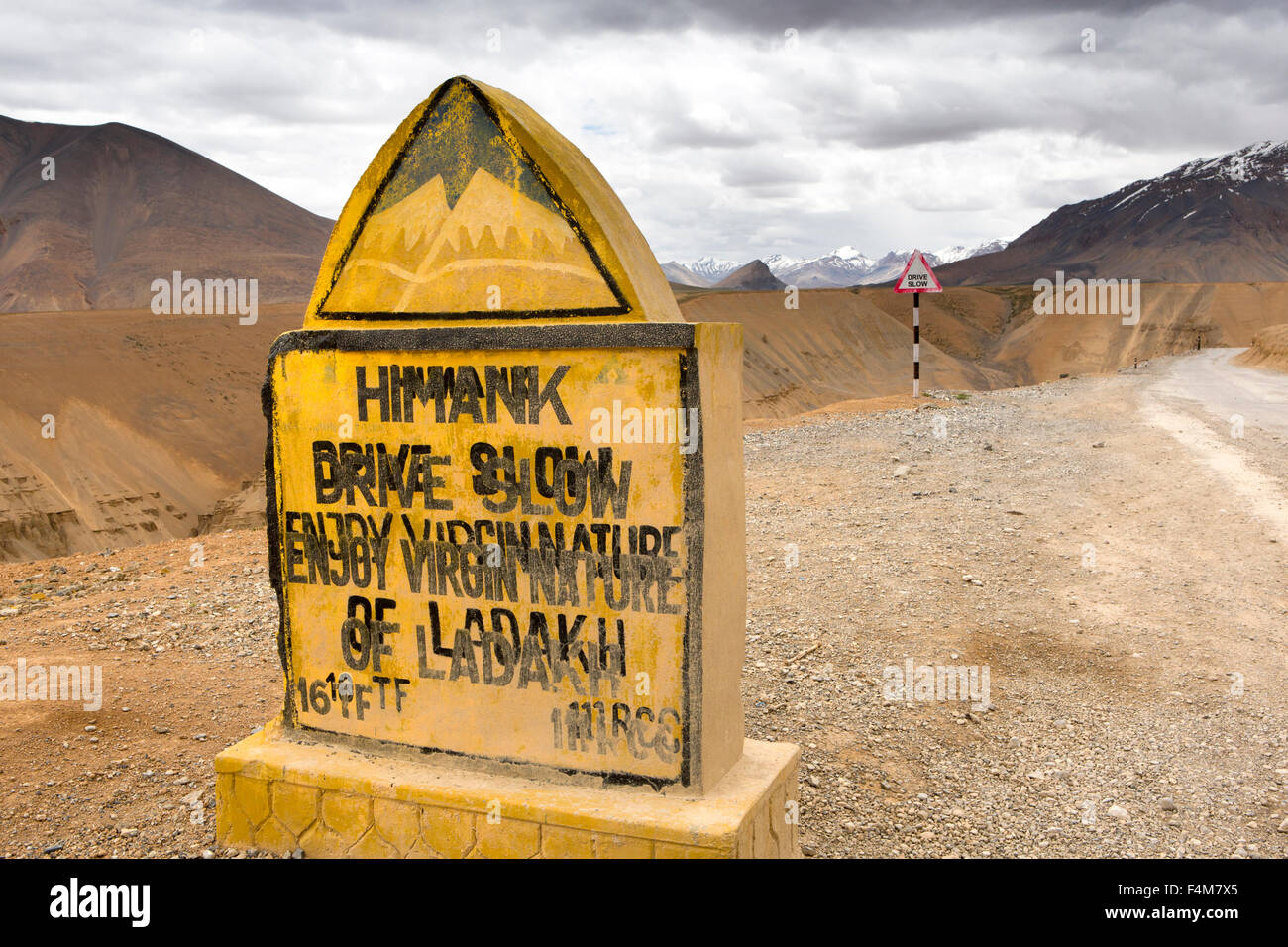 India, Jammu & Kashmir, Ladakh, Changtang, unreadable overpainted Himank road sign, blurred lettering Stock Photo