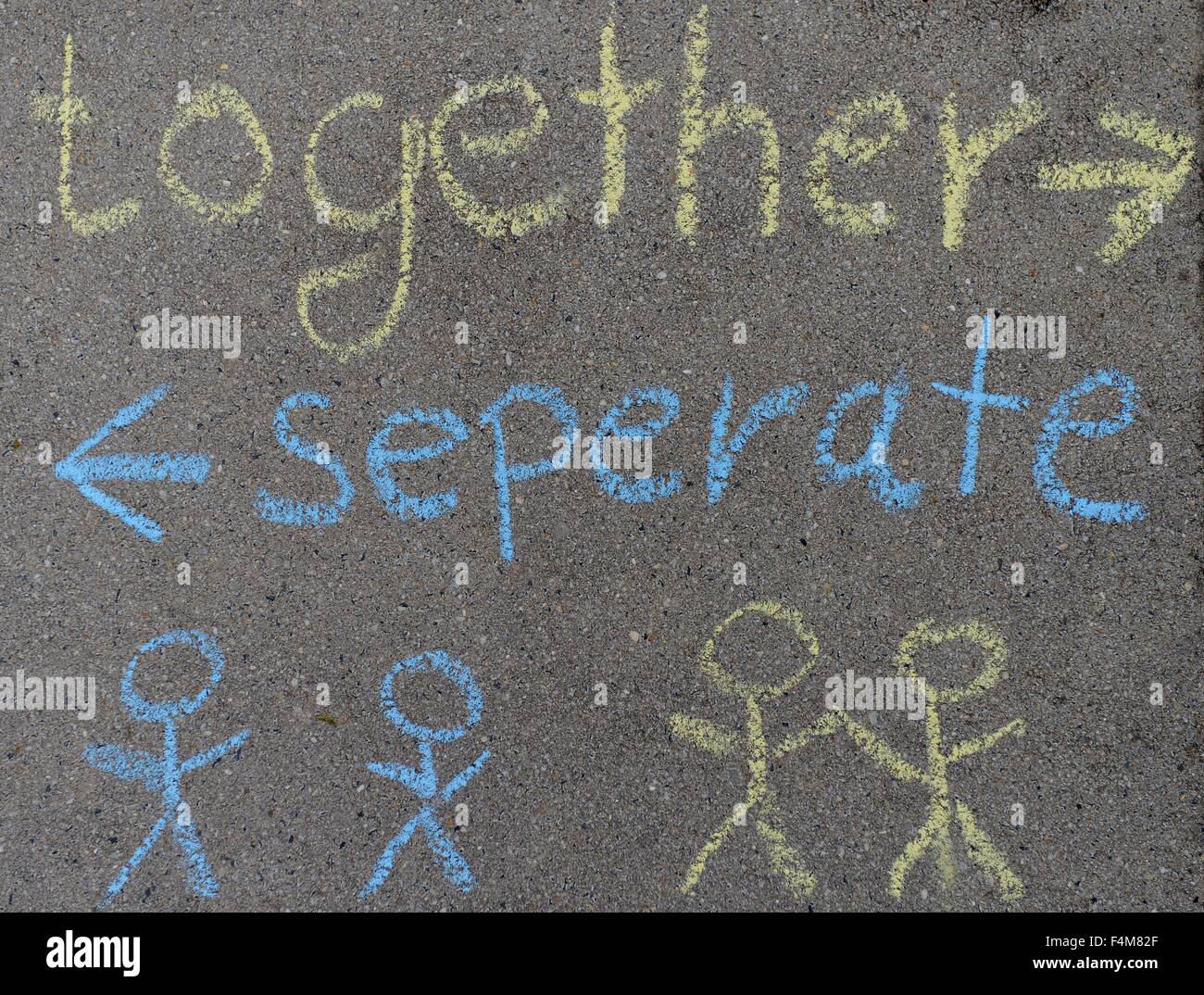 The chalkwritten words together and seperate. Stock Photo