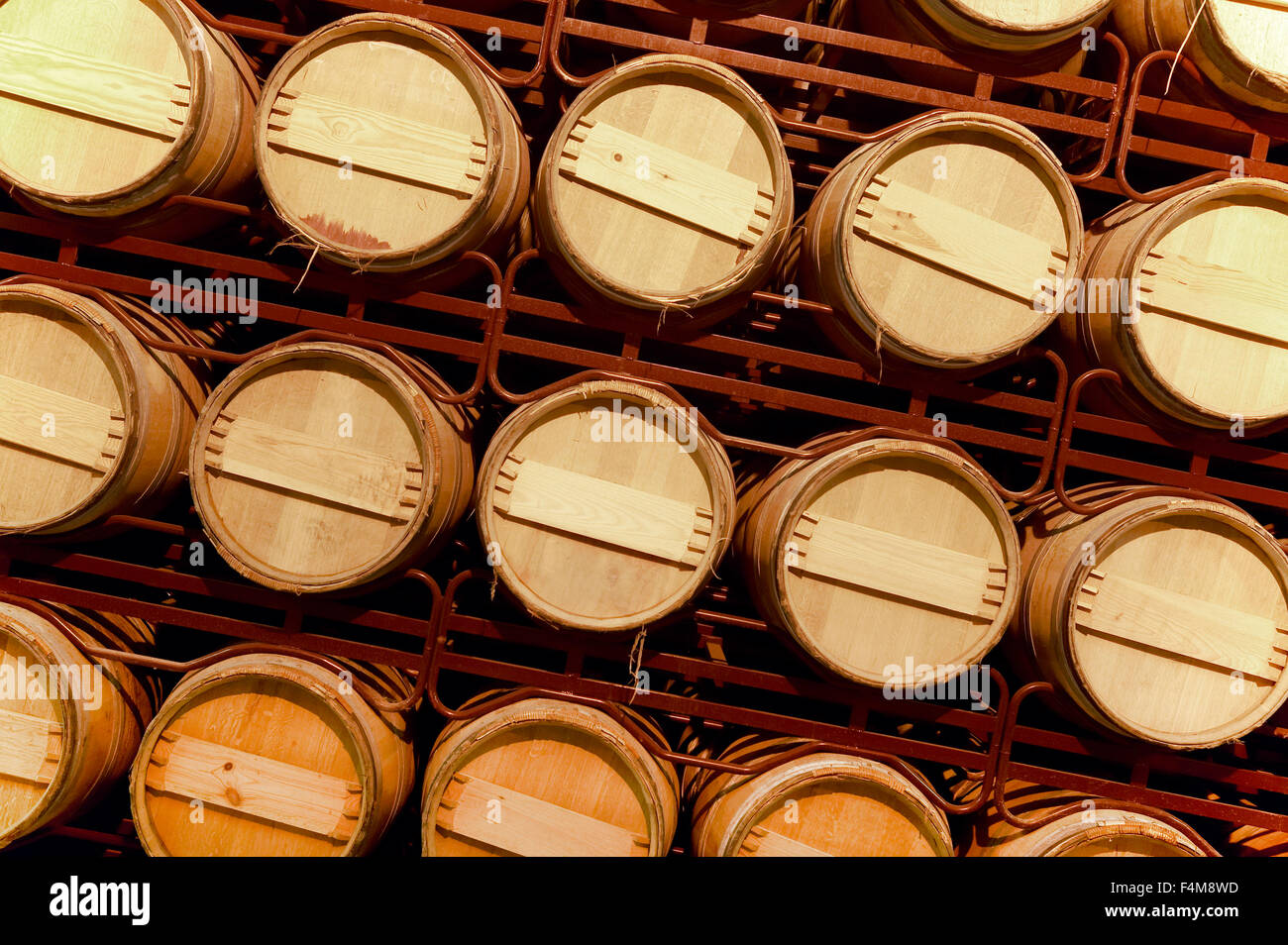 Wine barrels in an aging process at spanish cellar Stock Photo Alamy