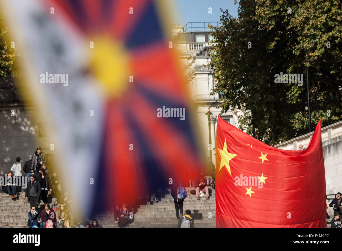 London, UK. 20th October, 2015. Free Tibet Protesters clash with pro-Chinese government supporters during President Xi Jinping’s Royal welcoming procession down The Mall beginning his state visit Credit:  Guy Corbishley/Alamy Live News Stock Photo