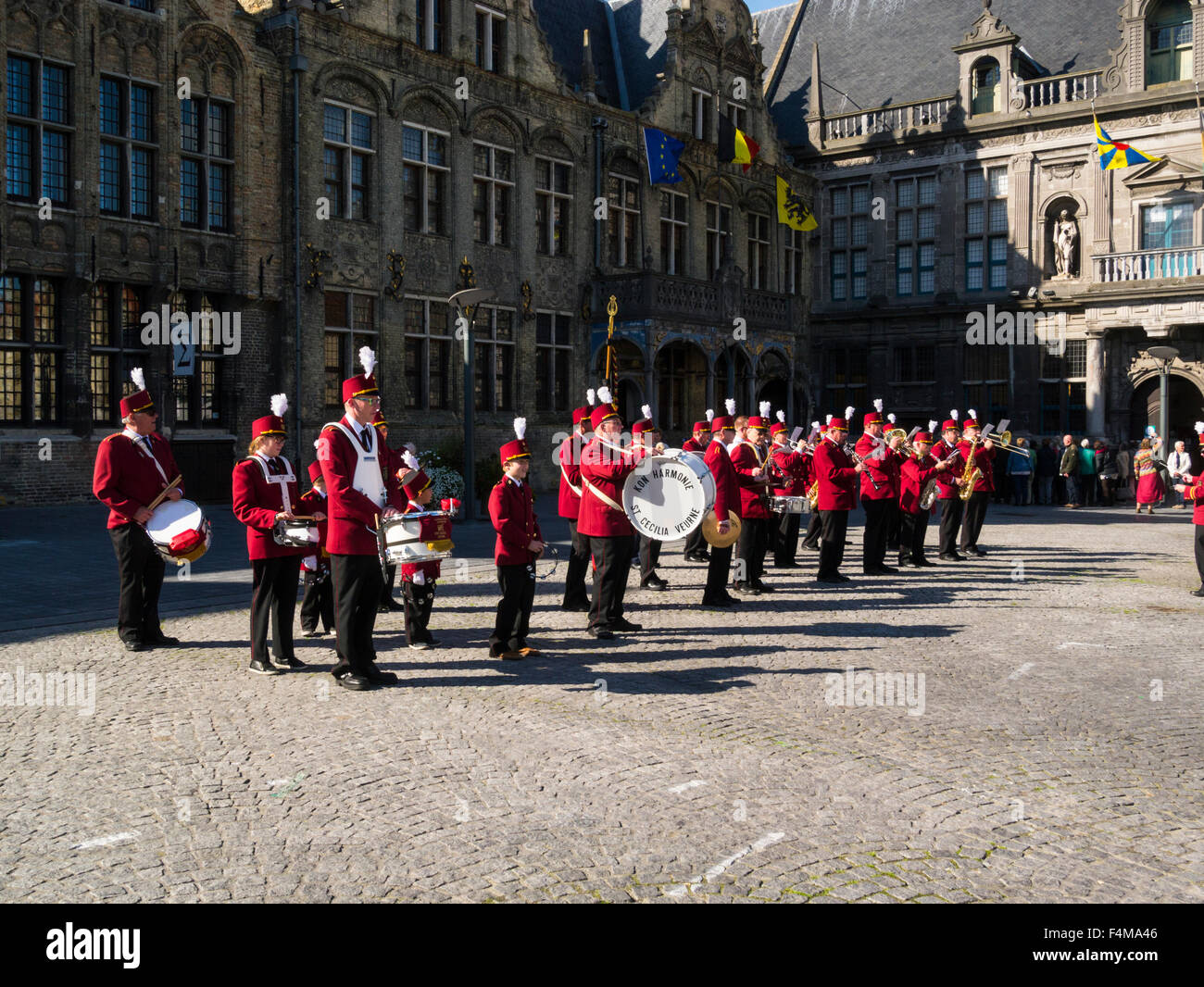 St Cecilia Kon Harmonie Band in red uniforms entertaining visitors