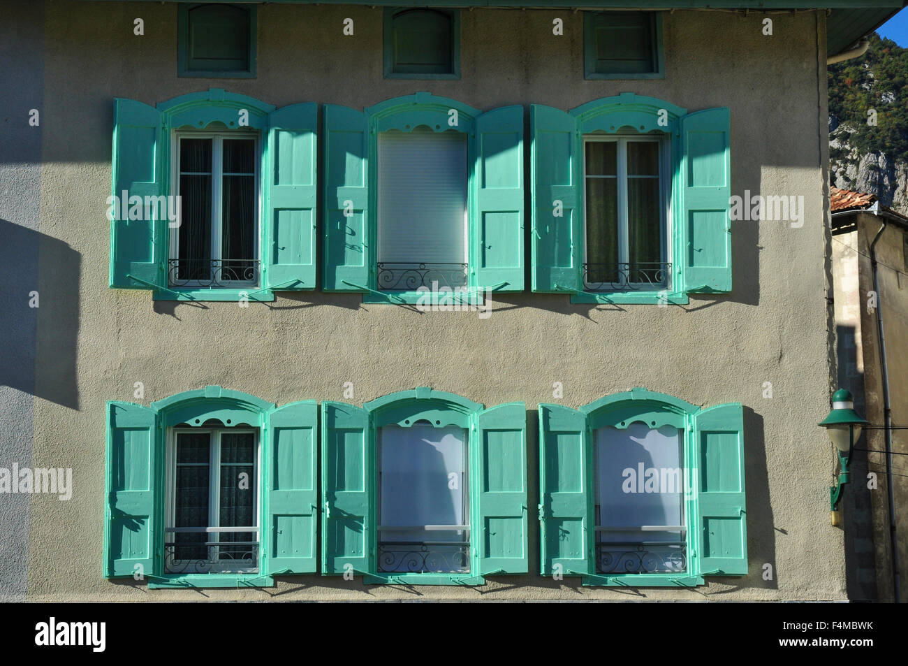 Shutters and windows, Tarascon, Ariege, Midi-Pyrenees, France Stock Photo