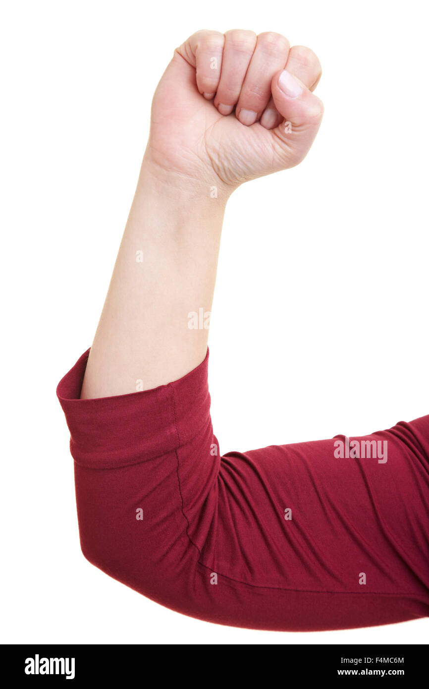 Woman flexing her biceps muscle on white background Stock Photo