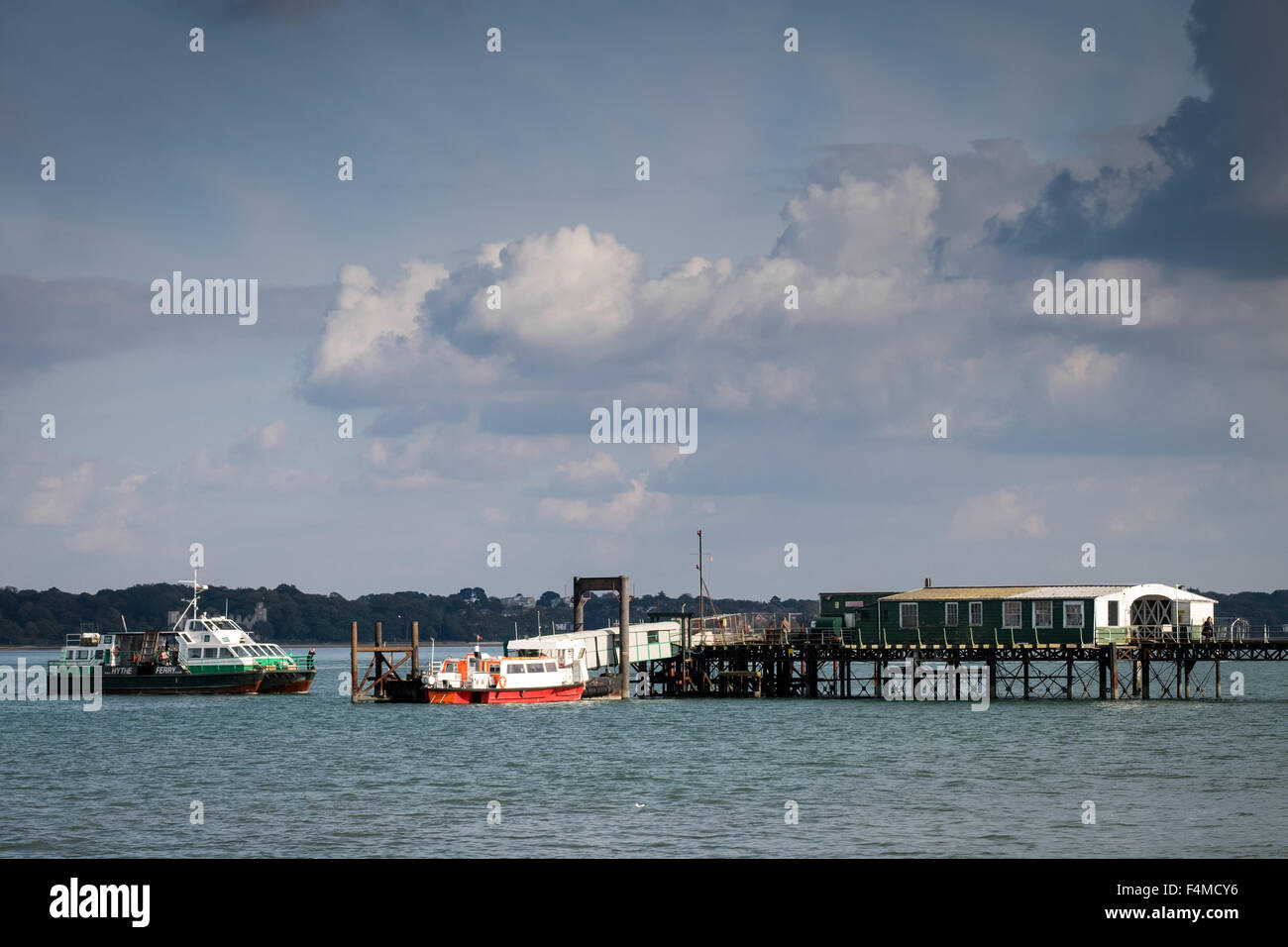 The Hythe Ferry arriving at Hythe Pier in the village of Hythe on the edge of the New Forest, near Southampton Stock Photo