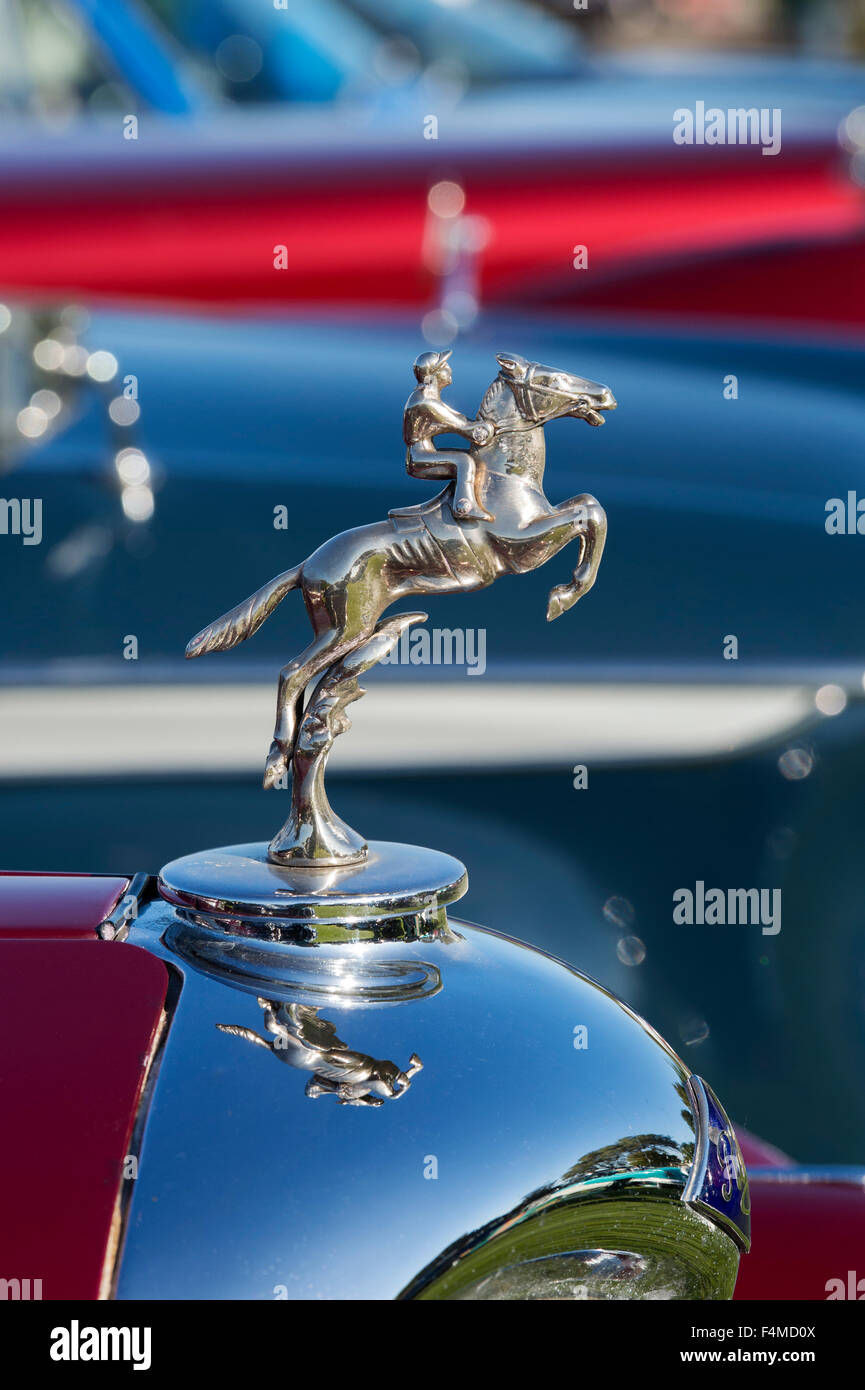 Horse and jockey hood ornament on a classic vintage car Stock Photo